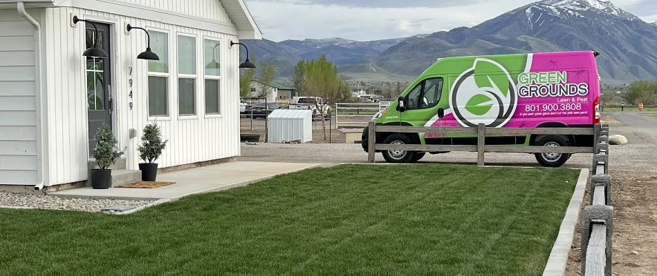 Van on a residential property in Mapleton, UT, with green grass.